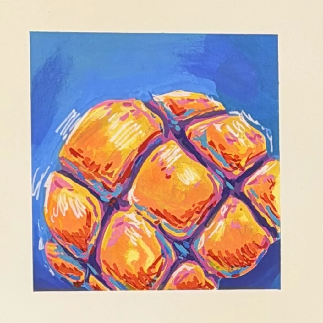 Hand-painted pineapple bun in expressive bright colors